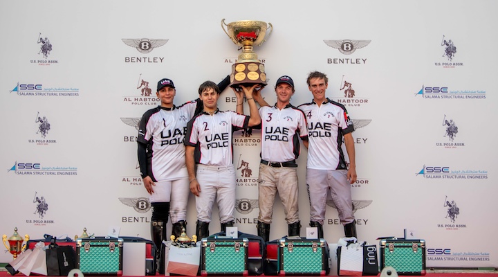 UAE team holding a trophy in gold cup 2025 Dubai Open