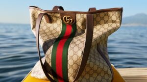 Gucci bag in sea background