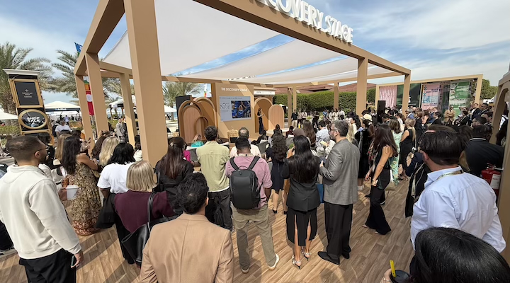 Delegates listen to a presentation at ShopTalk Luxe.