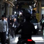 People visit the Grand Bazaar, ahead of the Iranian New Year